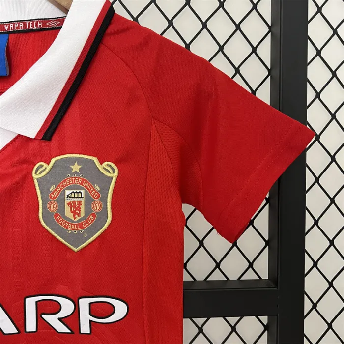 Camiseta retro de local del Manchester United para niños 99/00
