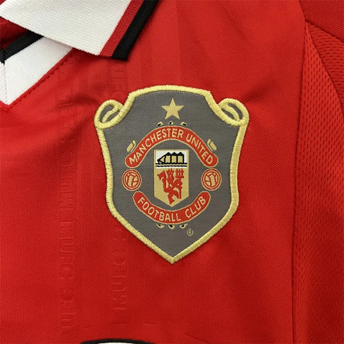 Camiseta retro de local del Manchester United para niños 99/00