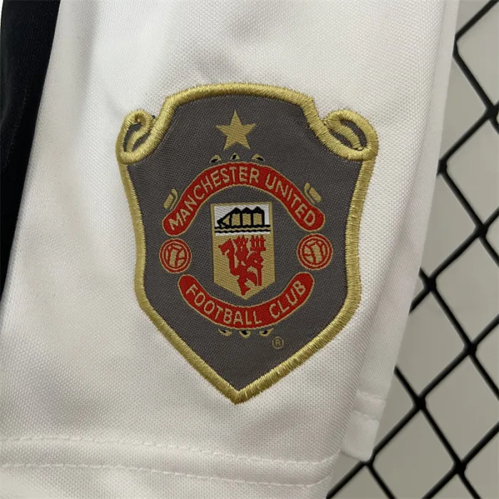 Camiseta retro de local del Manchester United para niños 99/00