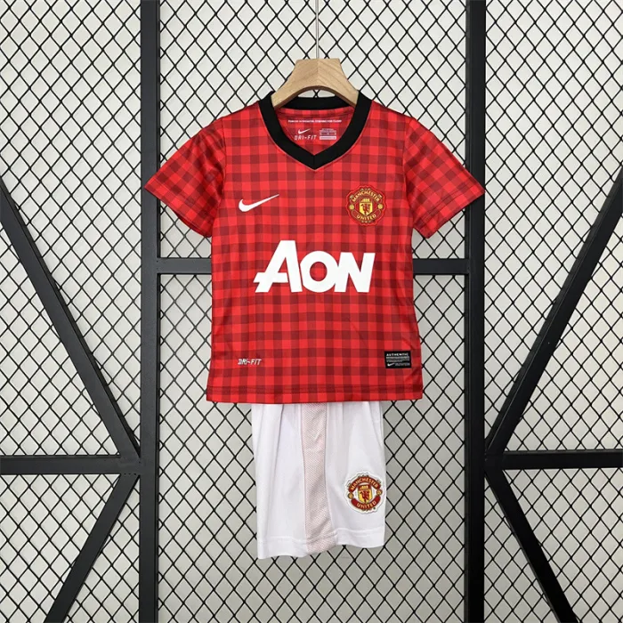 Camiseta retro de local del Manchester United para niños 12/13