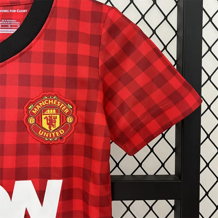Camiseta retro de local del Manchester United para niños 12/13