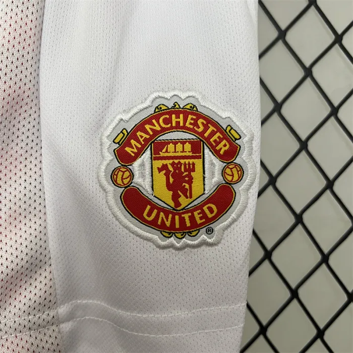 Camiseta retro de local del Manchester United para niños 12/13