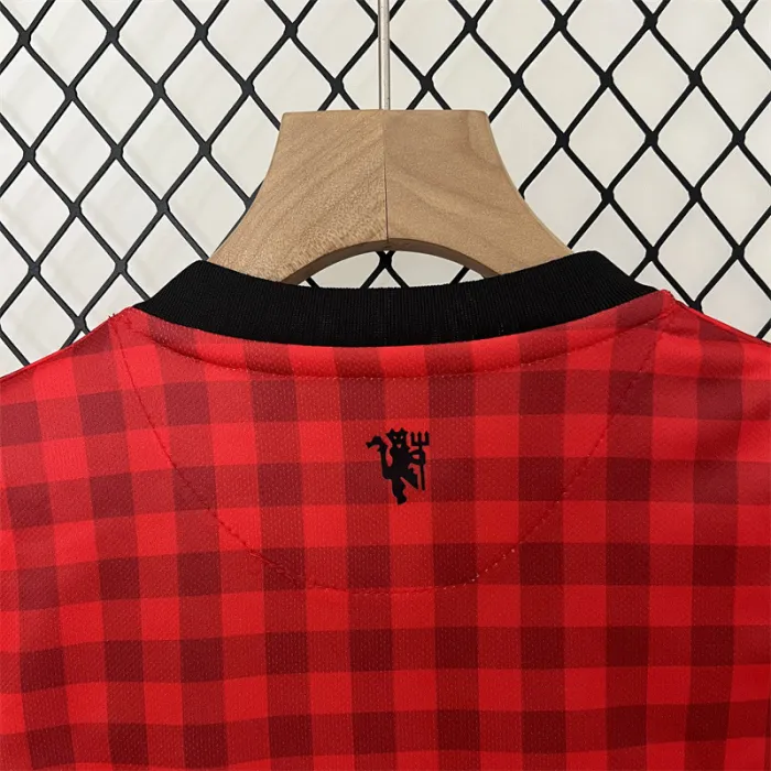 Camiseta retro de local del Manchester United para niños 12/13