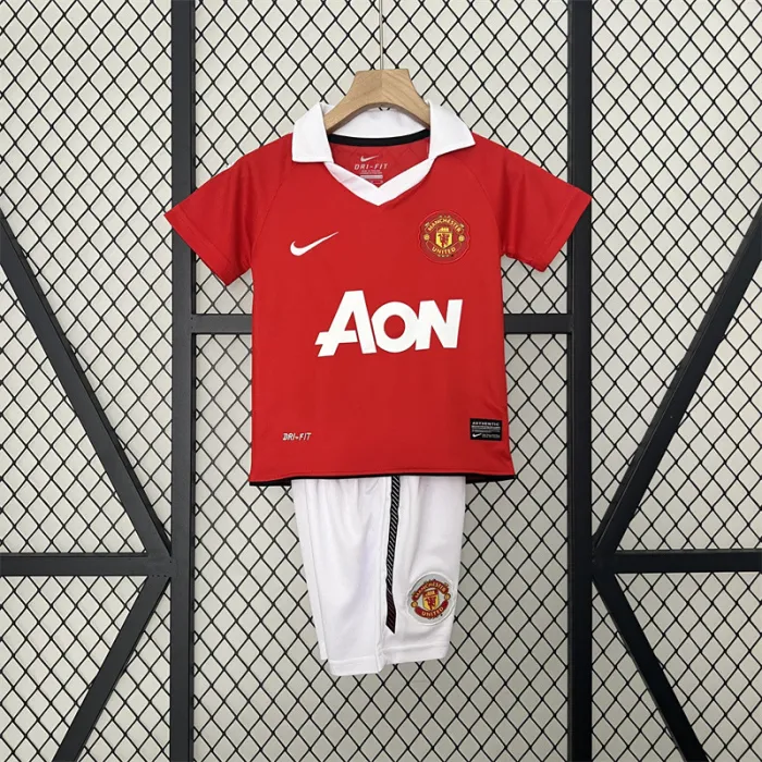Camiseta retro de local del Manchester United para niños 10/11