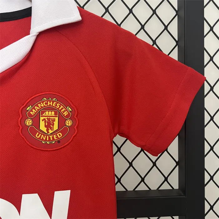 Camiseta retro de local del Manchester United para niños 10/11