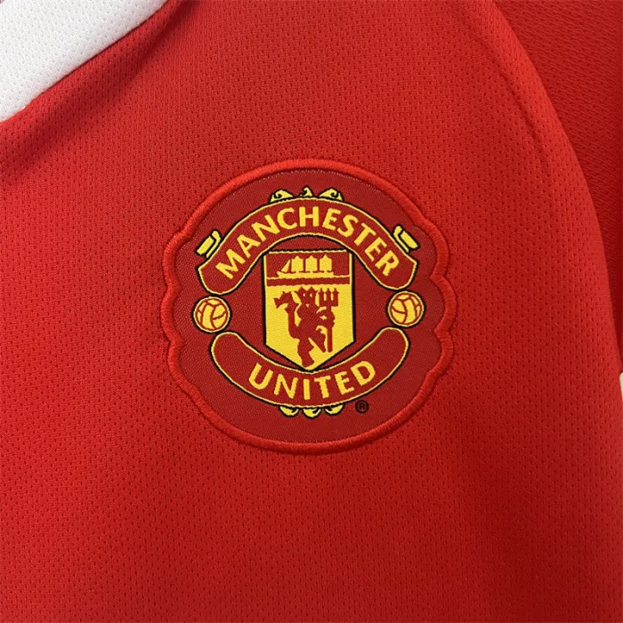 Camiseta retro de local del Manchester United para niños 10/11
