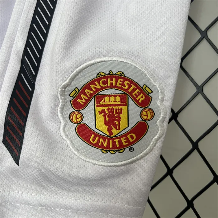 Camiseta retro de local del Manchester United para niños 10/11