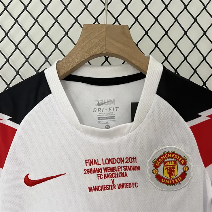 Camiseta retro de visitante del Manchester United para niños 10/11