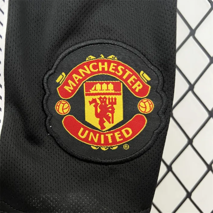 Camiseta retro de visitante del Manchester United para niños 10/11