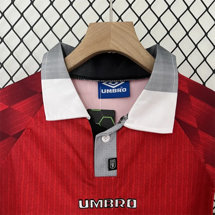 Camiseta retro de local del Manchester United para niños de la temporada 96/97