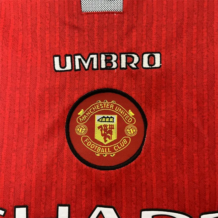 Camiseta retro de local del Manchester United para niños de la temporada 96/97